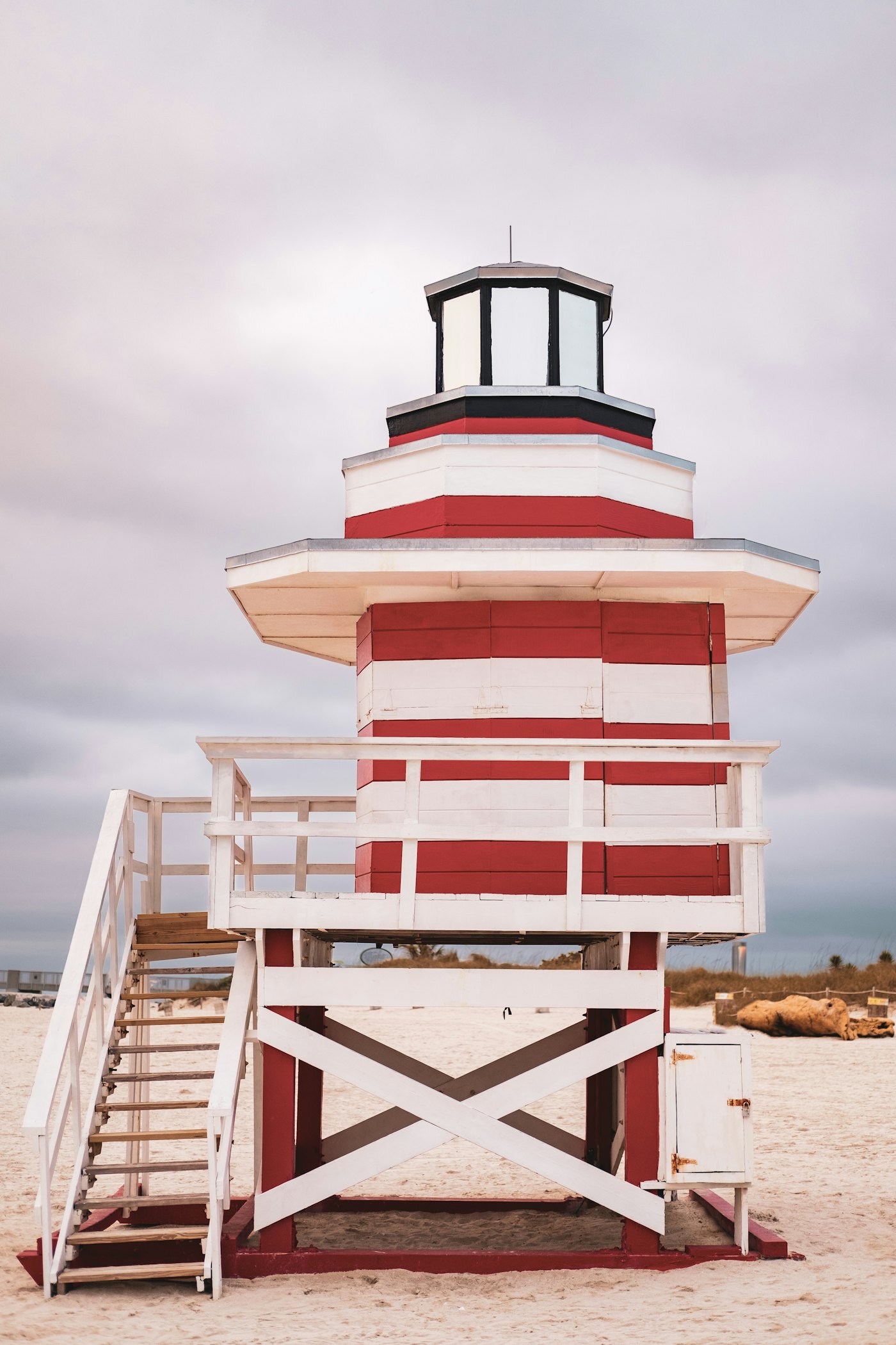 A red and white striped lifeguard tower on Miami Beach